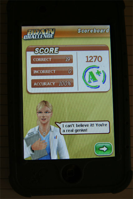 Screenshot of an IPod game with a female doctor saying, "You're a real genius."